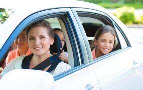 Family driving a car rental in Granada